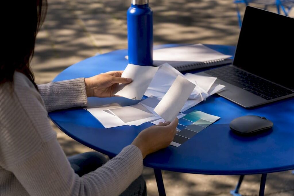 Hands adjusting lead magnet content on desk